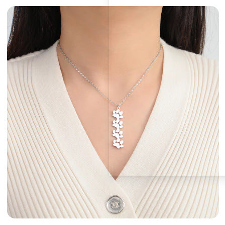New fashion trend, no fading, cute smooth surface cat paw titanium steel necklace, men's and women's universal engraved cross chain