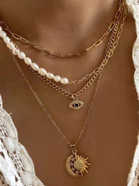 Gold plated pearl eye multi-layer necklace