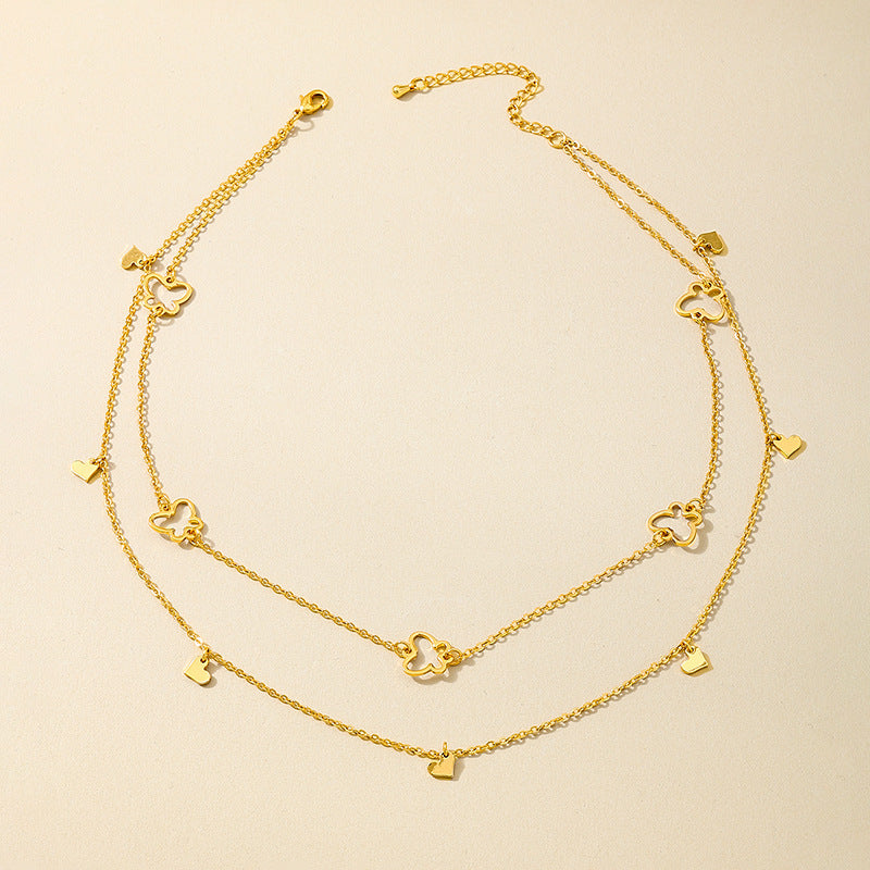 Gold hollow butterfly heart necklace