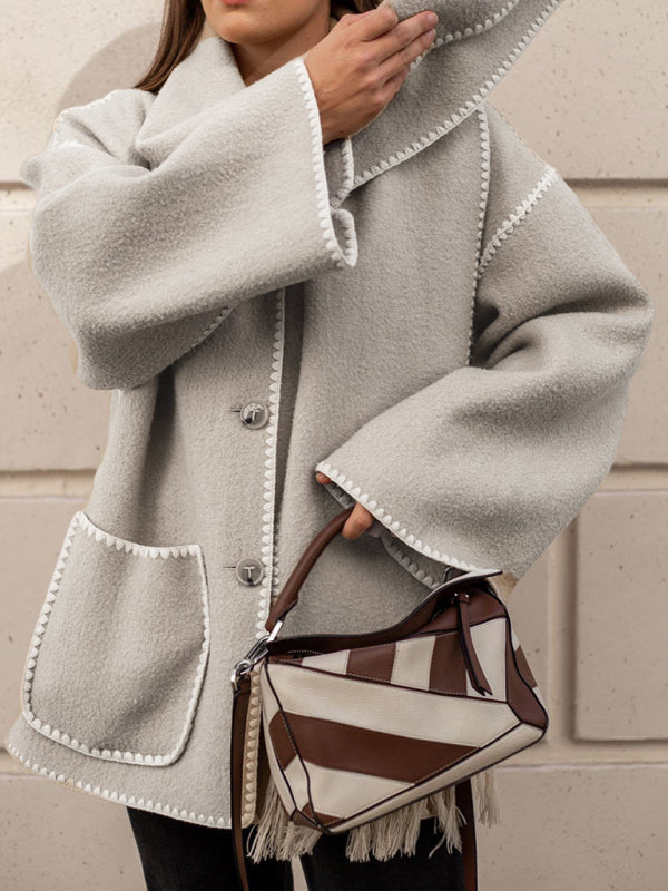 Woolen coat with scarf tassels